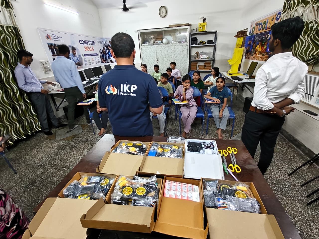IKP team distributing STEAM kits